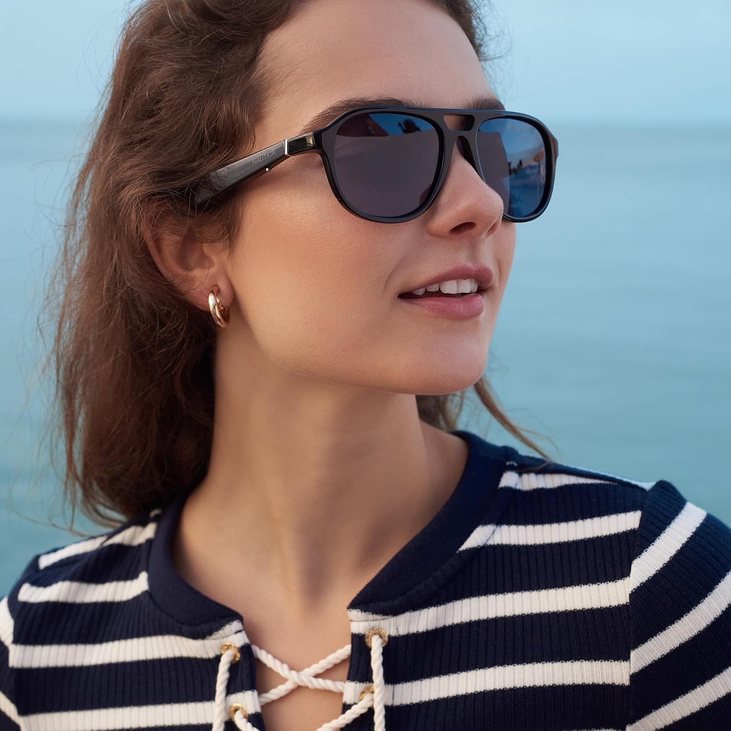 image:imageLucyd Nautica Commander Smart Sunglasses for Men amp Women Wireless Smart Glasses with Open Ear Speakers and Microphone Polarized UV400 Lenses Black Navy Blue StandardCommander Black Navy Blue Standard